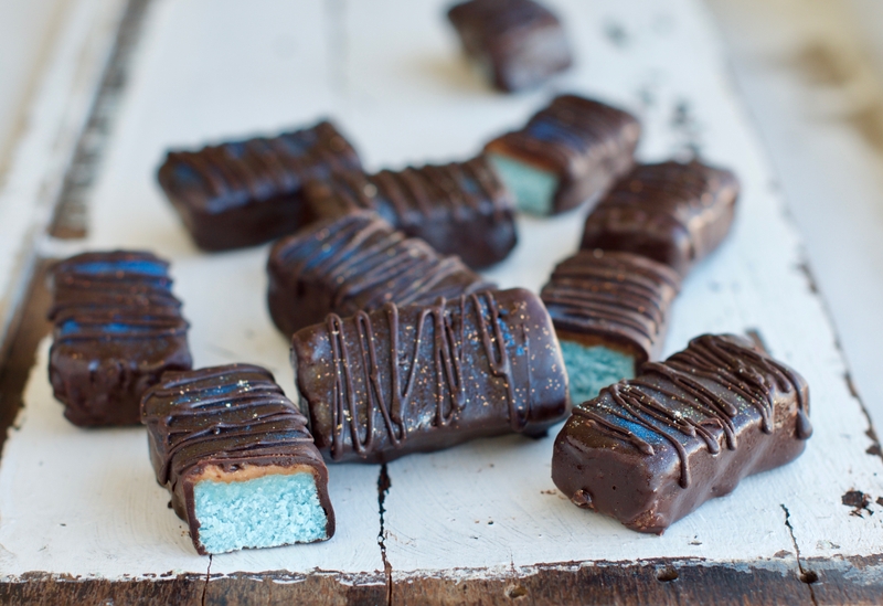 Bounty bars on wooden board